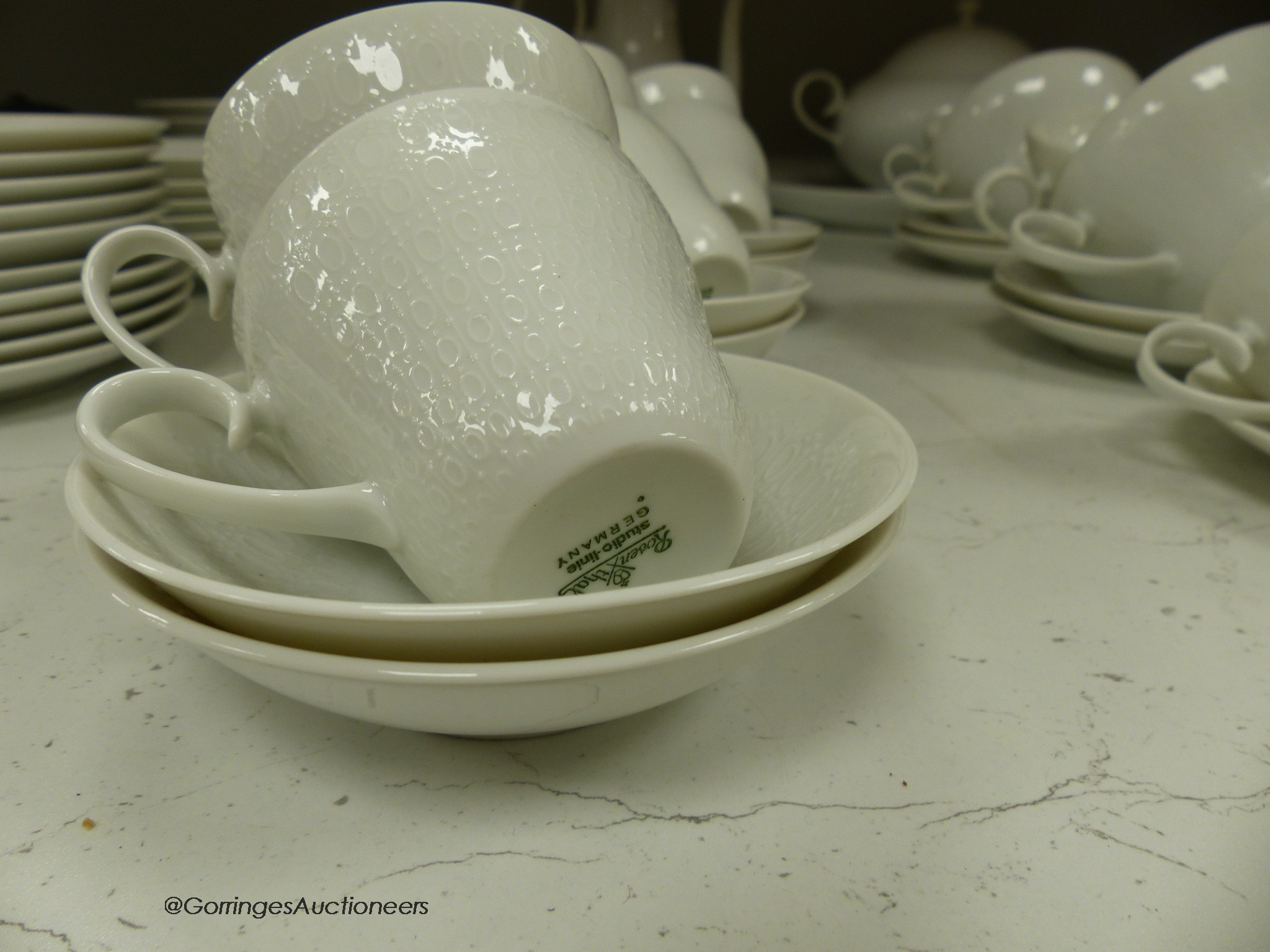 A Rosenthal studio-line relief moulded porcelain dinner and coffee service (52)